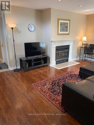 48 Bolton Street, Ottawa, ON - Indoor Photo Showing Living Room With Fireplace