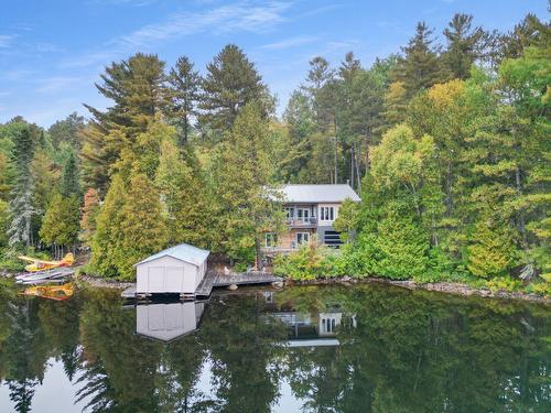 Face arrière - 1919 Ch. Du Ski, Laniel, QC - Outdoor With Body Of Water