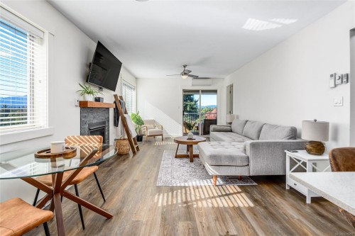 304-4685 Alderwood Pl, Courtenay, BC - Indoor Photo Showing Living Room With Fireplace