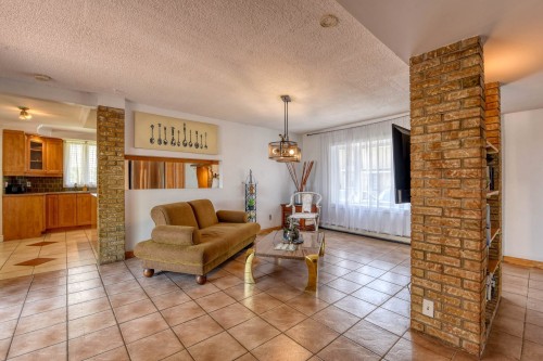 Living Room - 15 Rue Alfred, Laval (Sainte-Rose), QC - Indoor Photo Showing Living Room