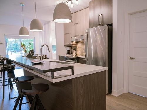 Cuisine - 112-1410 Av. De Rochechouart, Saint-Jérôme, QC - Indoor Photo Showing Kitchen With Upgraded Kitchen