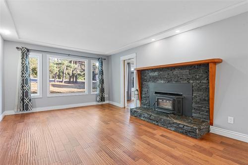 3585 Otter Lake Road, Armstrong, BC - Indoor Photo Showing Living Room With Fireplace