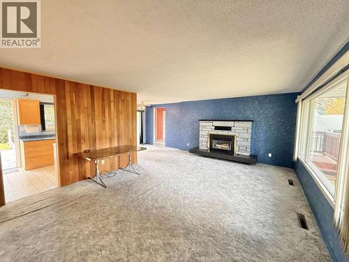 768 Vaughan Street, Quesnel, BC - Indoor Photo Showing Living Room With Fireplace