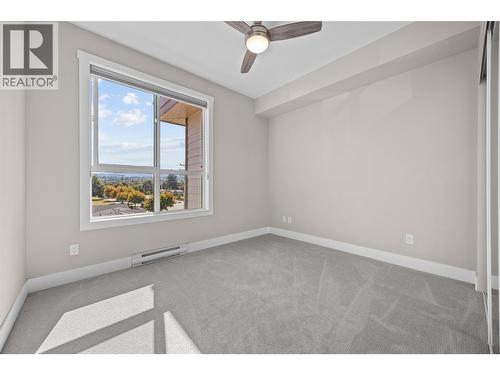 2nd Bedroom with custom blinds - 3090 Burtch Road Unit# 313, Kelowna, BC - Indoor Photo Showing Other Room