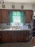 113 4Th Avenue Sw, Ituna, SK  - Indoor Photo Showing Kitchen With Double Sink 