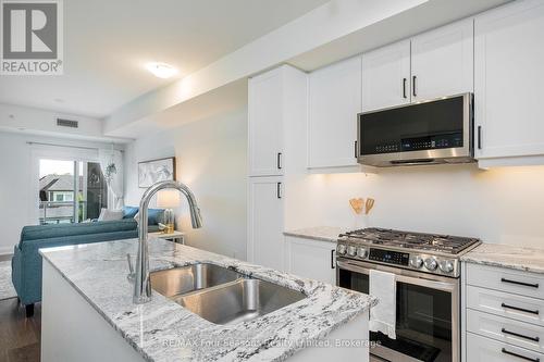208 - 17 Spooner Crescent, Collingwood, ON - Indoor Photo Showing Kitchen With Stainless Steel Kitchen With Double Sink With Upgraded Kitchen