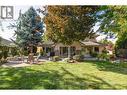 A private backyard with mature easy care landscaping. - 3875 Gallaghers Parkway, Kelowna, BC  - Outdoor 