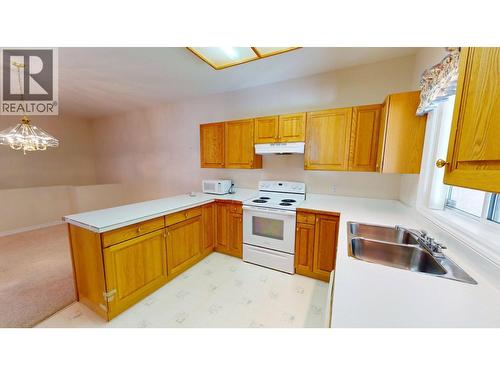 2205 Rockland Avenue Unit# 3, Trail, BC - Indoor Photo Showing Kitchen With Double Sink
