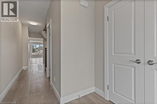 Hallway with baseboards - 256 Keeso Lane, Listowel, ON - Indoor Photo Showing Other Room