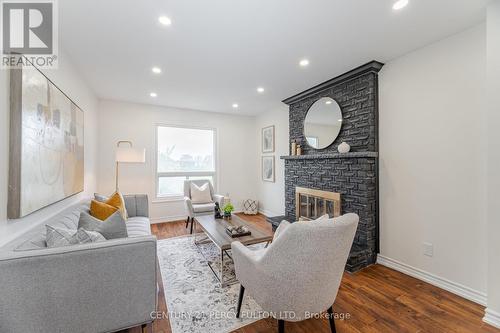 22 Lowder Place, Whitby, ON - Indoor Photo Showing Living Room With Fireplace