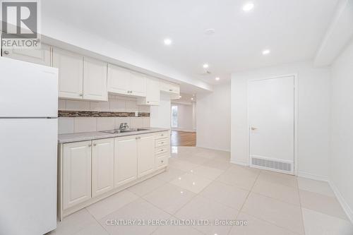 22 Lowder Place, Whitby, ON - Indoor Photo Showing Kitchen With Double Sink