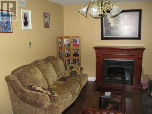93 Forest Road, Conception Bay South, NL - Indoor Photo Showing Living Room With Fireplace