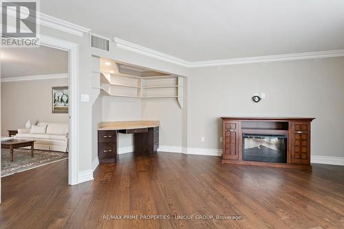 Second bedroom as office - 405 - 2010 Islington Avenue, Toronto, ON - Indoor Photo Showing Living Room With Fireplace