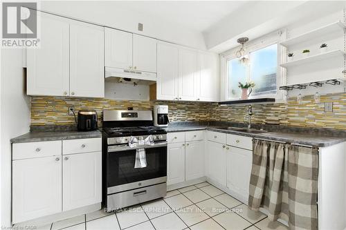 44 Holton Avenue N, Hamilton, ON - Indoor Photo Showing Kitchen With Double Sink