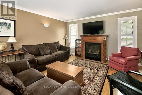788267 Grey 13 Road, Blue Mountains, ON - Indoor Photo Showing Living Room With Fireplace