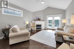 fireplace with custom surround, transom window - 