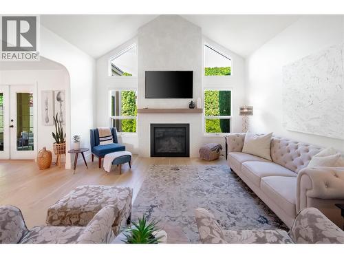 650 Lexington Drive Unit# 310, Kelowna, BC - Indoor Photo Showing Living Room With Fireplace