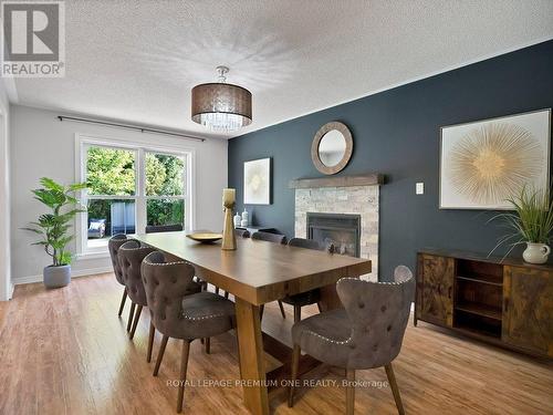 417 Kingsview Drive, Caledon, ON - Indoor Photo Showing Dining Room With Fireplace