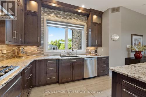 Upgraded backsplash/counters & cabinetry lighting. - 217 Shamus Way, Ottawa, ON - Indoor Photo Showing Kitchen With Upgraded Kitchen