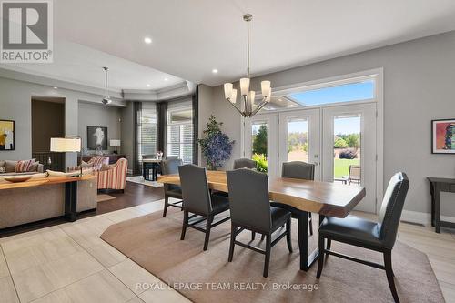 Patio doors in Dining area lead to covered patio. - 217 Shamus Way, Ottawa, ON - Indoor Photo Showing Dining Room
