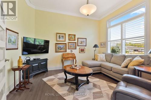 Bright and Cozy Den w/gleaming HDW floors. - 217 Shamus Way, Ottawa, ON - Indoor Photo Showing Living Room
