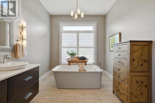 Stand alone tub ~ exudes peace & tranquilty. - 217 Shamus Way, Ottawa, ON - Indoor Photo Showing Bathroom
