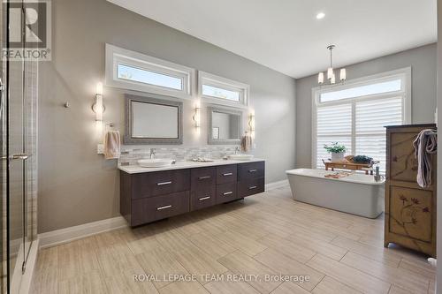 Lots of light, dbl sinks & separate tiled shower. - 217 Shamus Way, Ottawa, ON - Indoor Photo Showing Bathroom