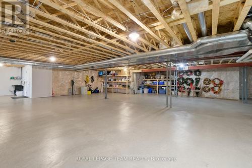 Workshop space in unfinished Lower Level. - 217 Shamus Way, Ottawa, ON - Indoor Photo Showing Basement