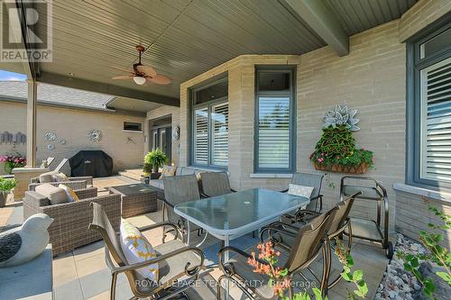 Eating area on rear stone patio. - 217 Shamus Way, Ottawa, ON - Outdoor With Deck Patio Veranda With Exterior