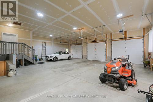 4 car Garage has direct access to Basement. - 217 Shamus Way, Ottawa, ON - Indoor Photo Showing Garage