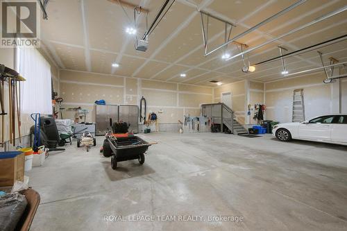 Room for everything here!! - 217 Shamus Way, Ottawa, ON - Indoor Photo Showing Garage