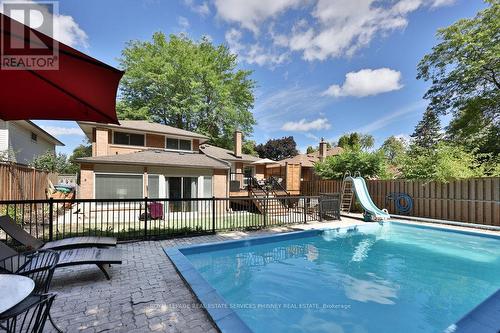 1404 Lewisham Drive, Mississauga, ON - Outdoor With In Ground Pool With Deck Patio Veranda