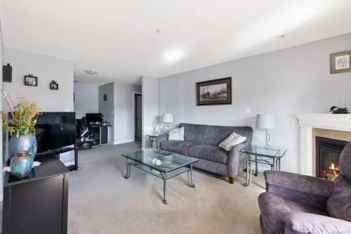 306-650 Dobson Rd, Duncan, BC - Indoor Photo Showing Living Room With Fireplace