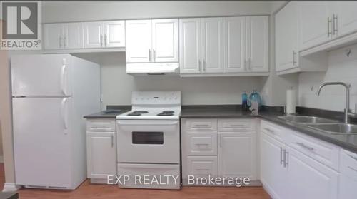 13 Foster Crescent, Brampton, ON - Indoor Photo Showing Kitchen With Double Sink