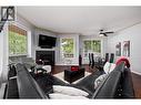 1964 Enterprise Way Unit# 115, Kelowna, BC  - Indoor Photo Showing Living Room With Fireplace 