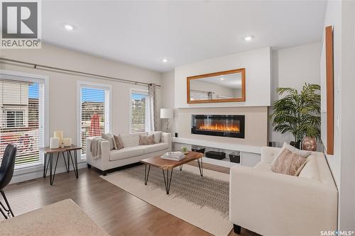 303 Dagnone Crescent, Saskatoon, SK - Indoor Photo Showing Living Room With Fireplace