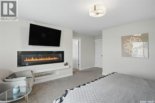 303 Dagnone Crescent, Saskatoon, SK - Indoor With Fireplace