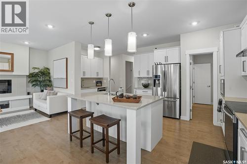 303 Dagnone Crescent, Saskatoon, SK - Indoor Photo Showing Kitchen With Stainless Steel Kitchen With Upgraded Kitchen