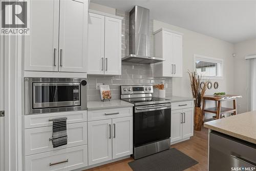 303 Dagnone Crescent, Saskatoon, SK - Indoor Photo Showing Kitchen With Upgraded Kitchen