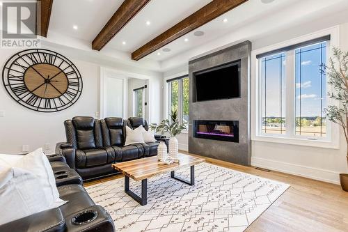22 East John Street, Innisfil (Cookstown), ON - Indoor Photo Showing Living Room With Fireplace