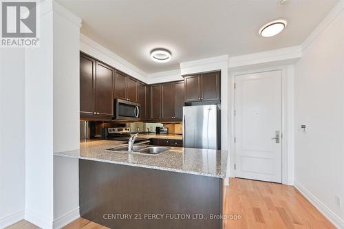 317 - 20 Bloorview Place, Toronto, ON - Indoor Photo Showing Kitchen With Double Sink