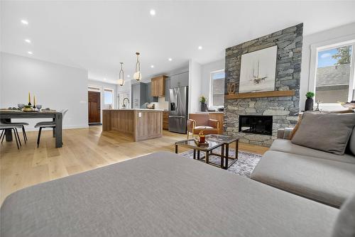 153 The Whins, Cranbrook, BC - Indoor Photo Showing Living Room With Fireplace