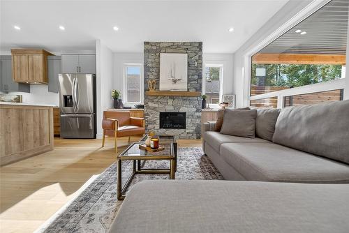 153 The Whins, Cranbrook, BC - Indoor Photo Showing Living Room With Fireplace