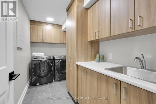 Lower level Laundry w/tons of storage & SS sink. - 504 Barrage Street, Casselman, ON - Indoor Photo Showing Laundry Room