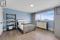 Spacious Bedroom w/hardwood floors. - 