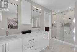 Double sinks & tile shower in Ensuite. - 