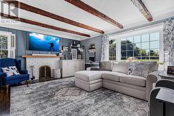 Main floor family room, wood-burning fireplace - 