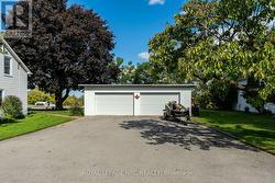 Detached garage, with oversized doors - 