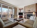 Living room - 10-270 Rue Du Mont-Plaisant, Mont-Tremblant, QC  - Indoor Photo Showing Living Room With Fireplace 