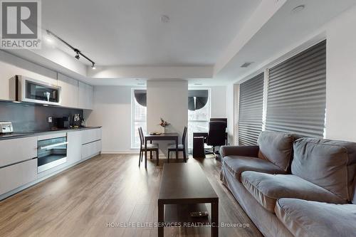 702 - 327 King Street W, Toronto, ON - Indoor Photo Showing Living Room